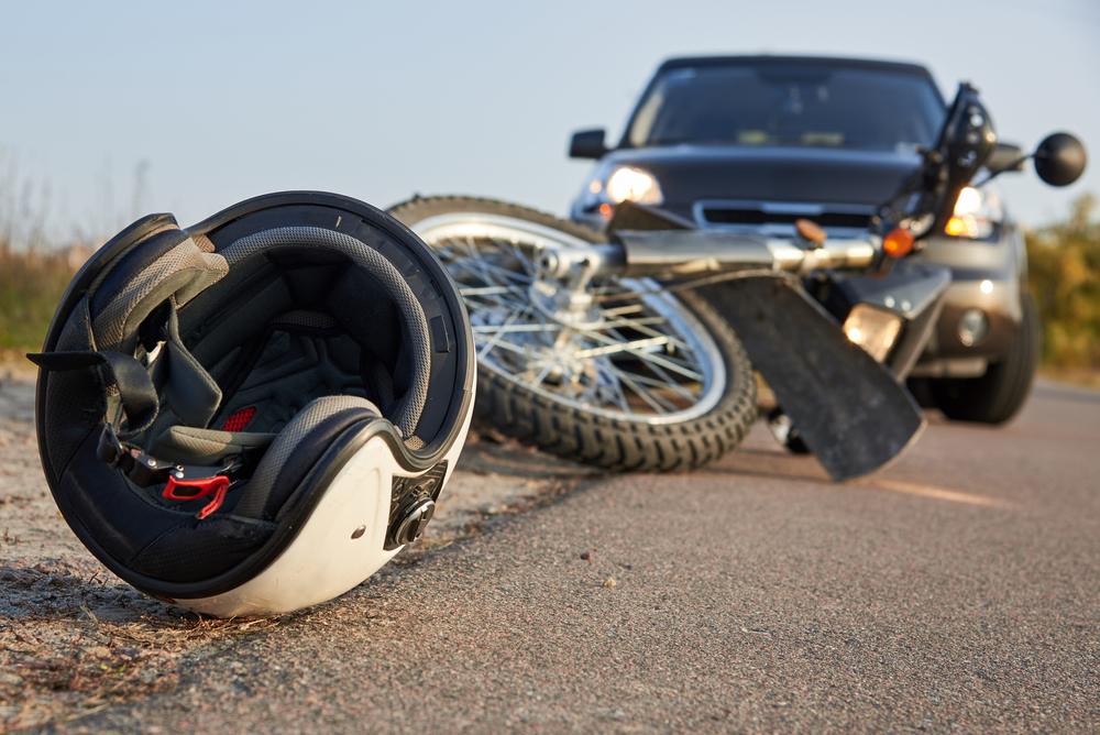 helmet and motorcycle on road