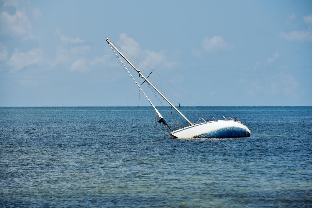 sailboat runs aground and sinks